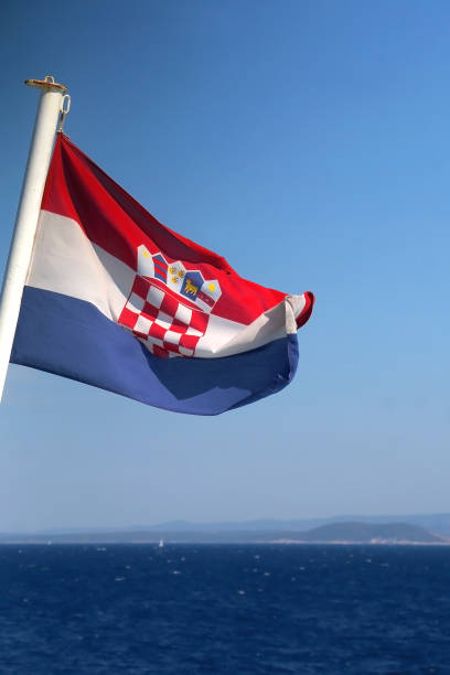 istock Croatian Flag and Adriatic Sea 1366967732