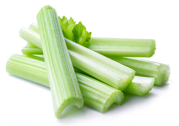 istock Pile of celery ribs isolated on white background. 1366969053