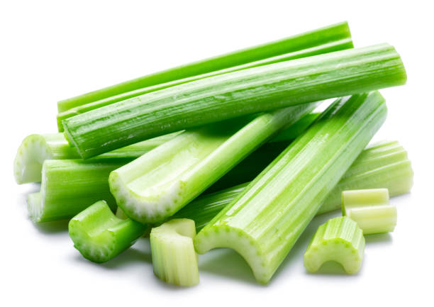 istock Pile of celery ribs isolated on white background. 1366969201