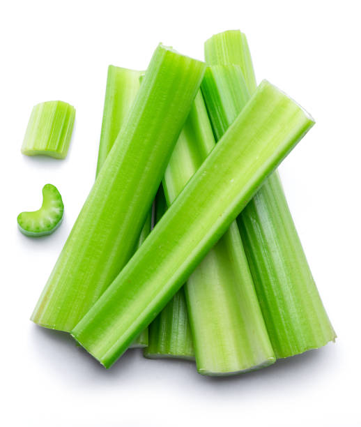 istock Pile of celery ribs isolated on white background. 1366969254