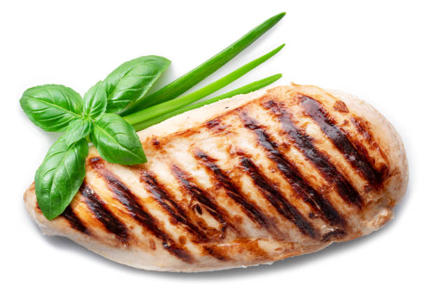 istock Grilled chicken fillet with herbs isolated on white background. 1366969415