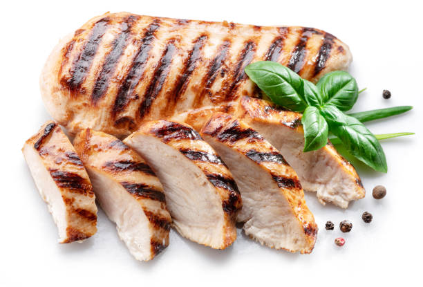 istock Grilled chicken fillet with herbs isolated on white background. 1366969427