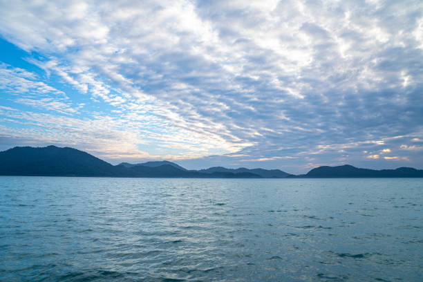 istock The ocean and islands are covered by clouds. 1366969798