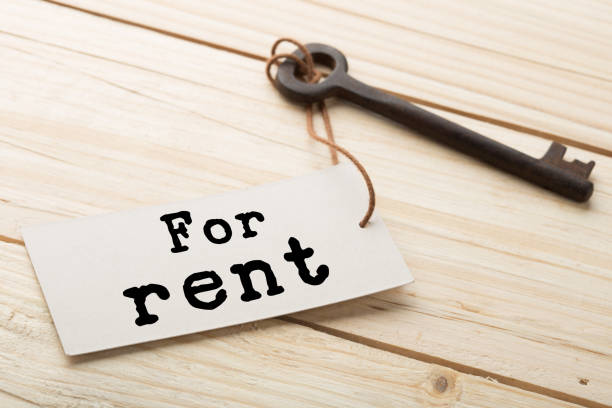 istock real estate rent concept - old key with tag 1366970023