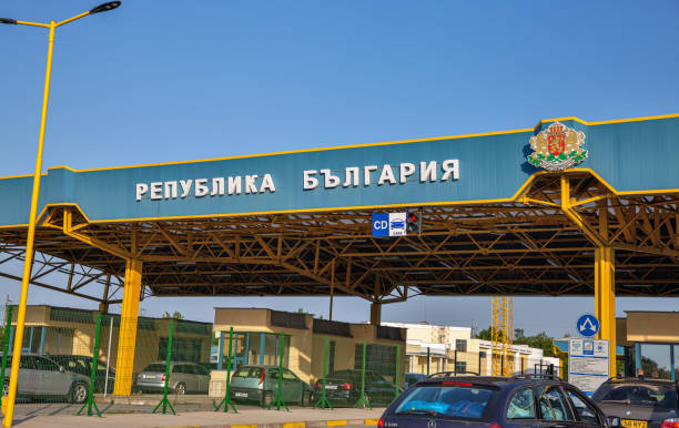 Cars at customs chekpoint crossing Romania - Bulgaria state border. stock photo