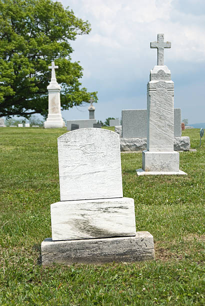 istock Blank Cemetery Headstone of White Marble, Close Up 136697110