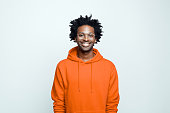 Portrait of cheerful man in orange hoodie