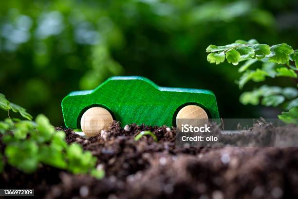 Wooden Toy Car In The Nature Concept Of Sustainable Mobility Stock Photo - Download Image Now