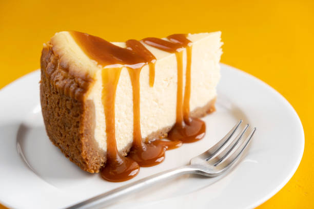 istock Slice of cheesecake with caramel topping 1366972666