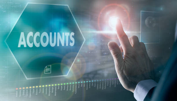istock A businessman controlling a futuristic display with an Accounts concept on it. 1366973588