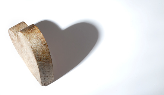 Wooden heart, valentine day on white basckground , copy space