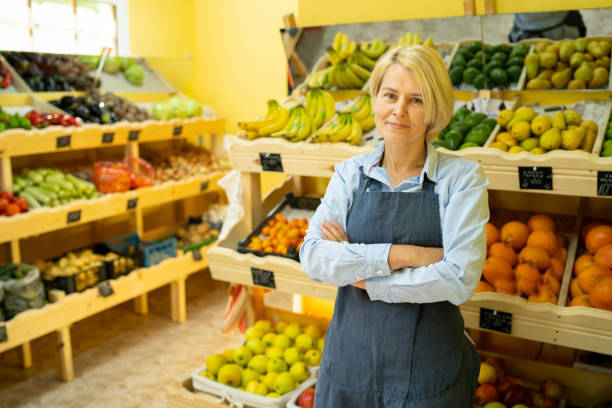istock Portrait of a confident grocery owner at work looking at camera 1366975138