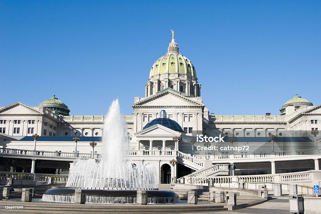 Capitol Building of Pennsylvania with Fountain, Harrisburg, PA Pennsylvania state capitol government building in Harrisburg, rear view with water fountain and rotunda, USA. Pennsylvania Stock Photo