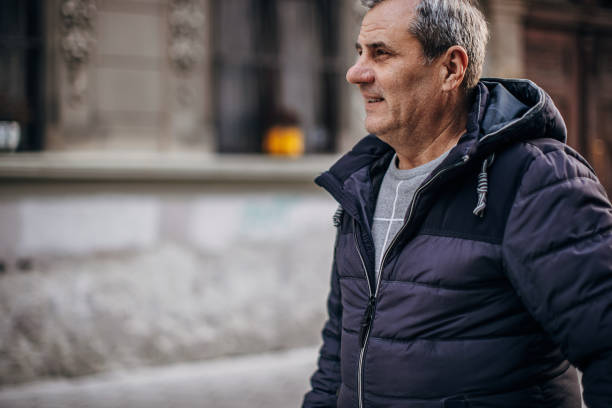 istock A man walks down the street 1366976063