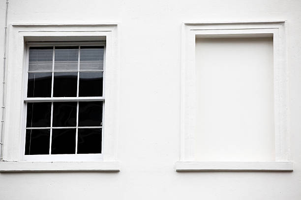 istock Photo georgian windows architecture on a wall house 136697614