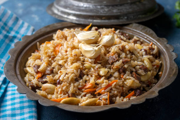 istock Traditional delicacies, Uzbek pilaf (Turkish name; Ozbek pilavi) 1366981120