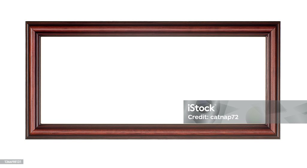 Panoramic Picture Frame in Red Brown Wood, White Isolated Panoramic picture frame in red brown, long design element isolated on white, studio shot. Picture Frame Stock Photo