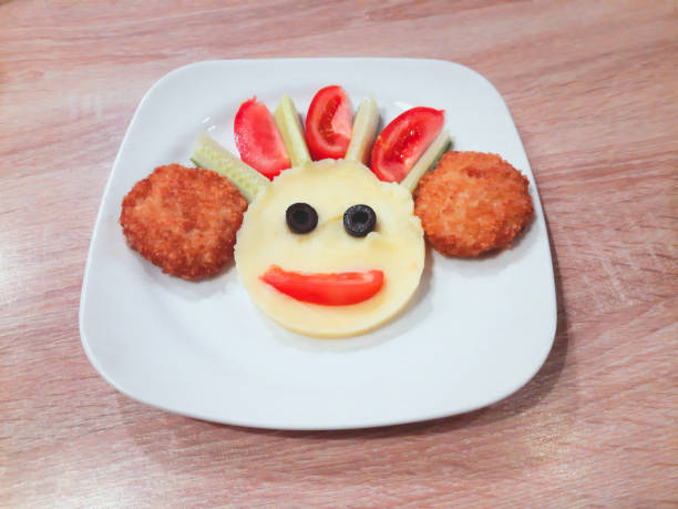 istock Children's menu potatoes vegetables and chicken cutlet 1366981702