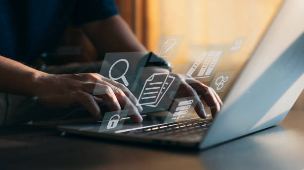 istock A virtual screen with icons representing ERP and document management concepts. 1366984976