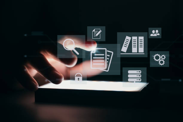 istock Concept of ERP and document management using icons on a virtual screen 1366984987