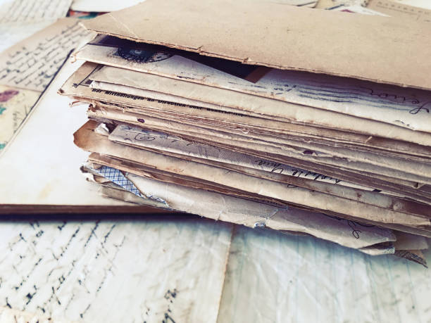 istock Stacked vintage letters and papers 1366985577