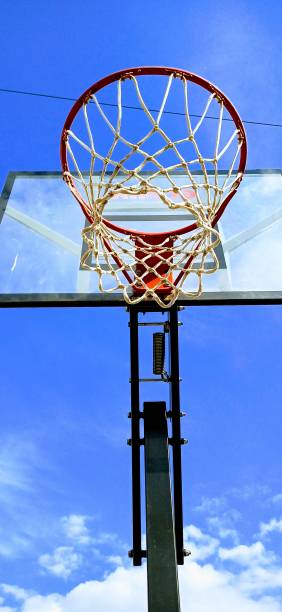 istock Basketball Hoop Blue Sky 1366986228