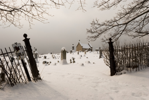 Graveyard Entrance in Snowy Overcast Winter Day, Cemetery View
