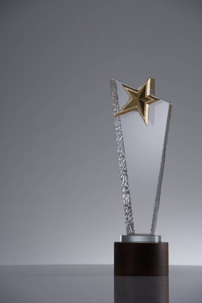 istock crystal star shape award trophy on gray background 1366990359