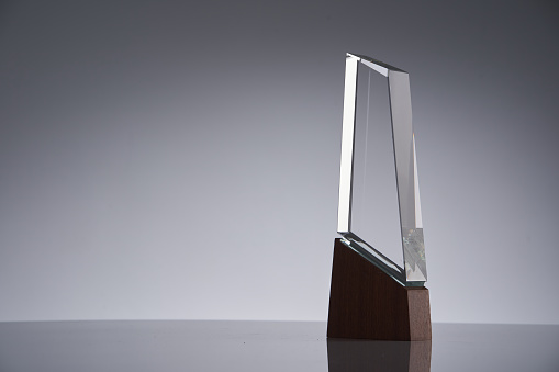 crystal award trophy on gray background