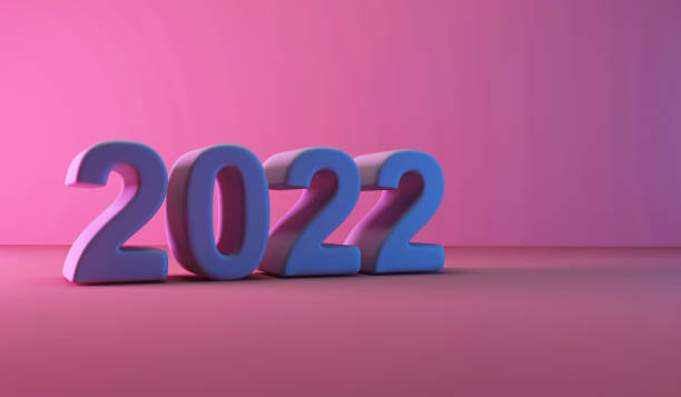 istock 2022 New Year Symbol on pink studio background 1366990689