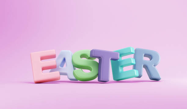 istock Happy Easter Color Text Symbol on pink studio background 1366991667