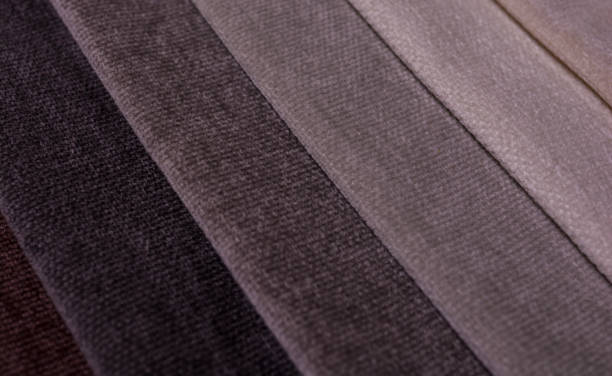 istock Samples of furniture fabrics.Multicolor fabric texture background. Chenille. 1366991887
