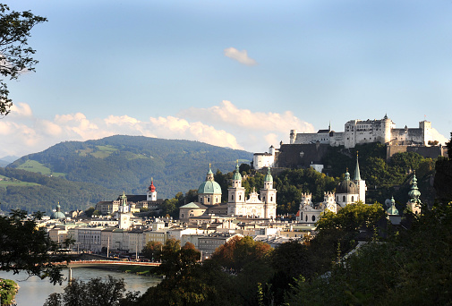 Fortress Hohensalzburg sits above Salzburg. This historic castle where Mozart performed is a visible landmark and an unmistakable feature of Salzburg's skyline.