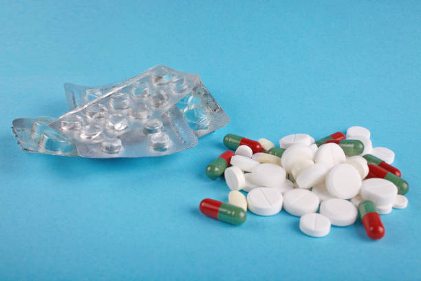 istock medical blisters packs opened and empty without pills and capsules top view 1366994080