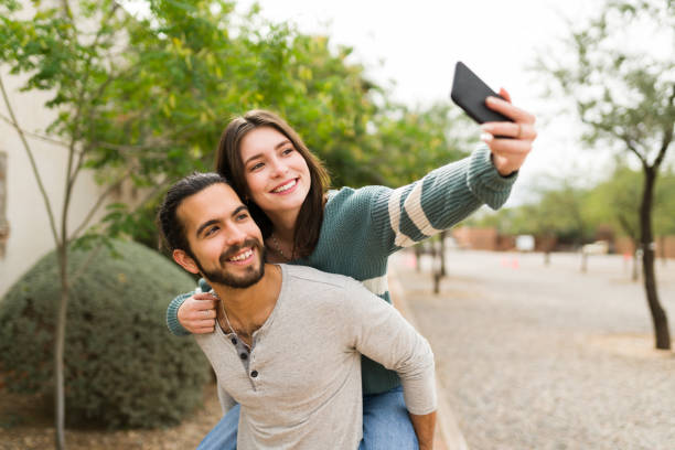 istock Fun couple having a great time at a date 1366999244