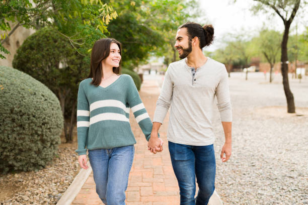 istock Attractive boyfriend and girlfriend dating 1366999525