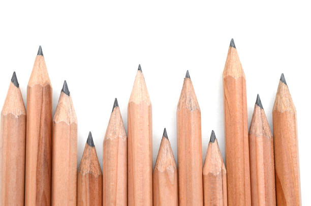 close up of black pencil in a row