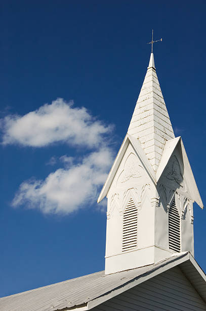 istock White Country Church Steeple Against Deep Blue Sky 136700099