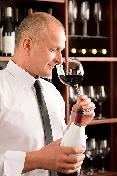 istock Bar waiter smell glass red wine restaurant 136700278