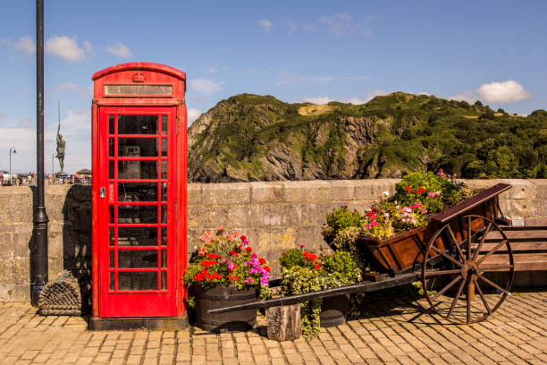 istock Red traditional English telephone box. Ilfracombe, North Devon, England, UK. 1367003013