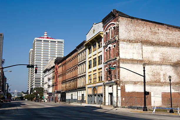 City buildings in old downtown commercial district, blighted urban area undergoing renewal, Louisville, Kentucky, KY, USA.