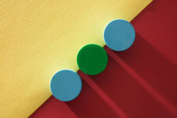 three circle block against red and yellow background