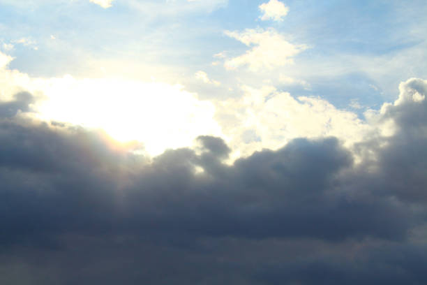 istock A beautiful cloudy sky, cumulus clouds and scorching sun. Background. Landscape. 1367004234