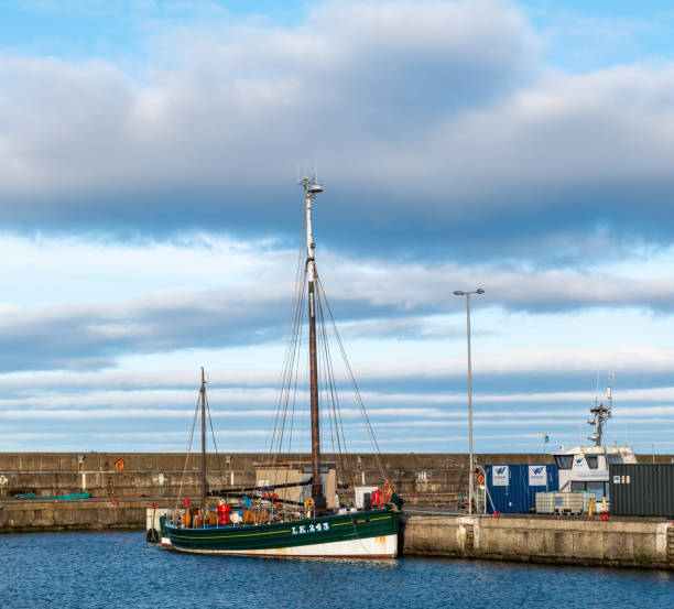 This is the Lerwick, Scotland registered sailing boat, Swan, berthed at the Harbour, Buckie, Moray, Scotland on 23 January 2022.