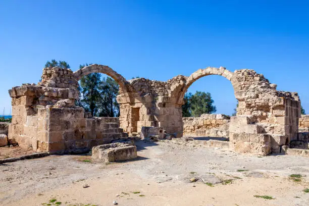 Ruins of Saranda Kolones (Saranta Kolones) inside the Kato Pathos (Paphos) Archaeological Park in Cyprus which is popular tourist holiday travel destination and landmark attraction, stock photo image