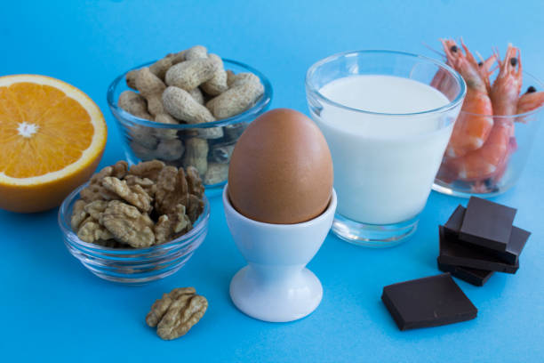 istock Close-up on food allergens on the blue background. Copy space. 1367004948