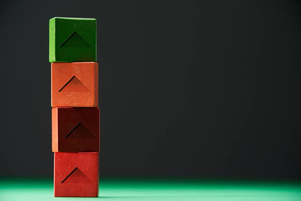 four wooden block against  black background