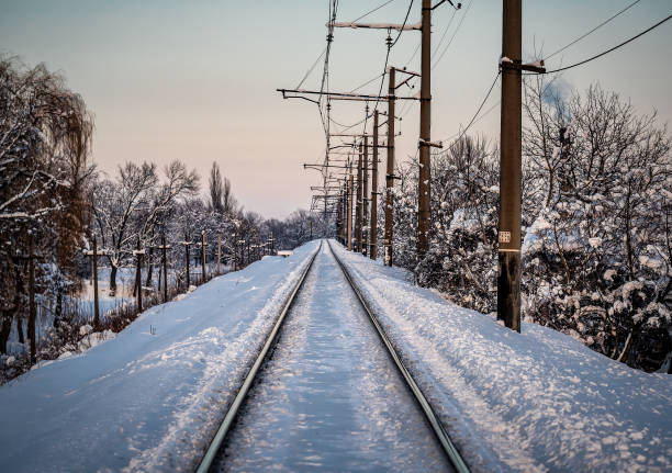 istock Winter rail way. The railway was covered with snow on a winter evening. 1367007158