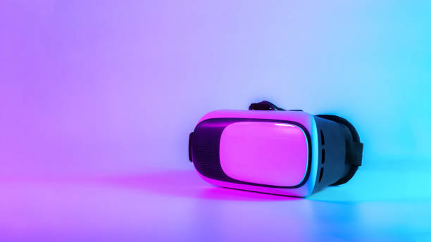 istock VR helmet virtual reality. 3d digital glasses on futuristic neon tech background. Future digital technology metaverse game concept. 1367008816