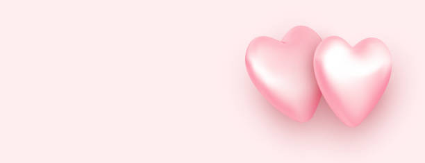 istock Pair of 3d light pink hearts. Valentine's day banner with space for text. 1367009215